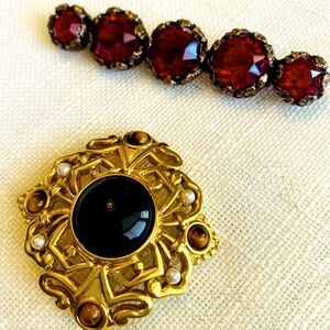 Avante and Kramer brooches